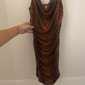 Tiger print rouched mini dress. Worn once. Too big for me now but so flattering